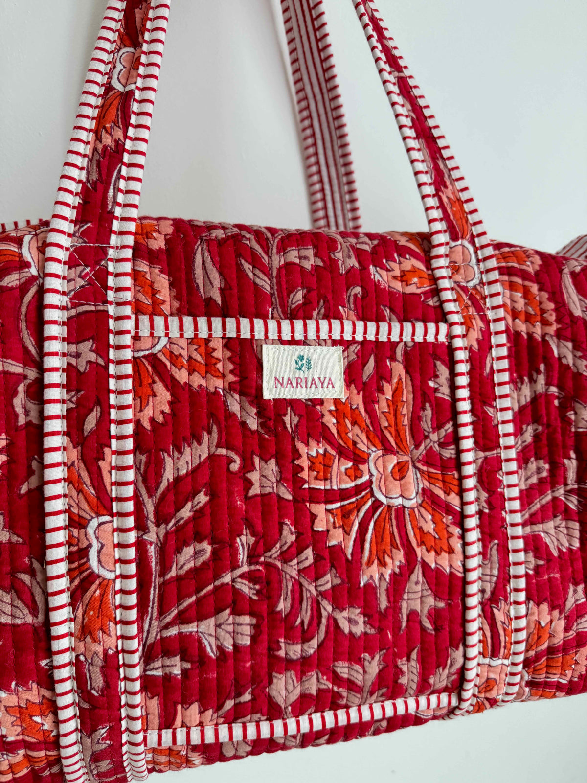 Red Floral Quilted Duffle Bag