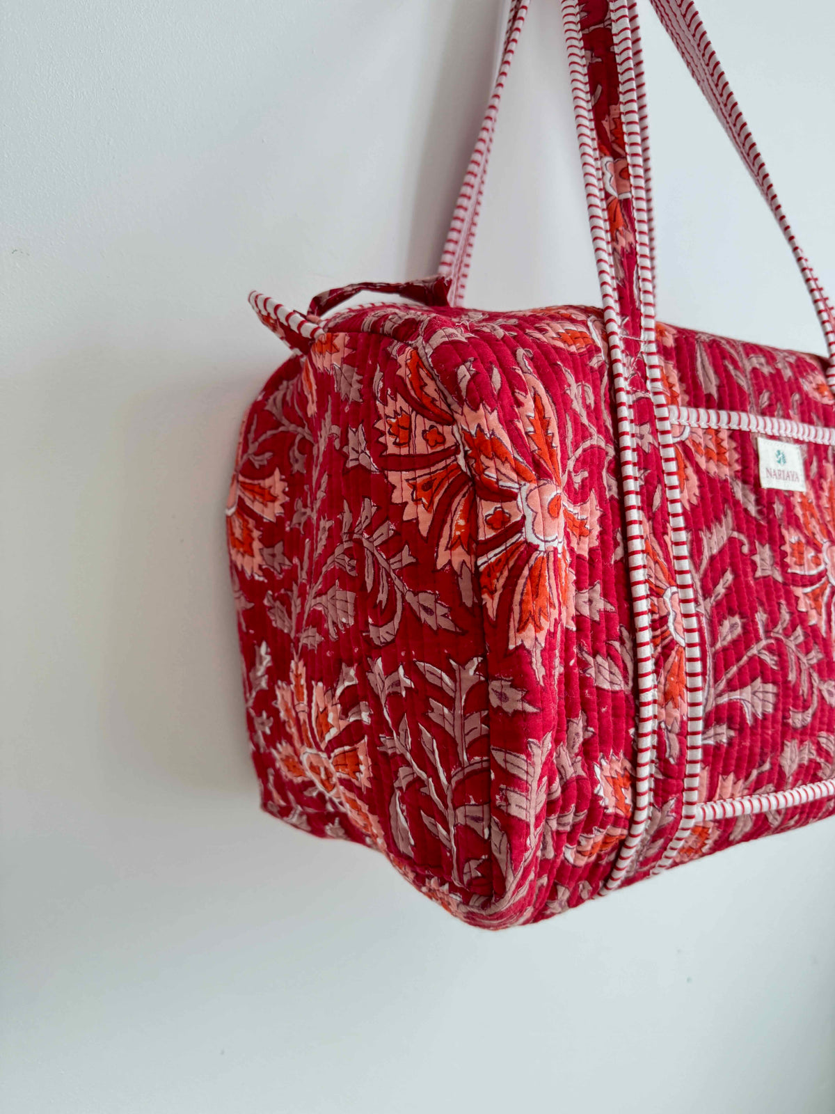 Red Floral Quilted Duffle Bag